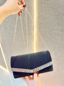 Elegant black pleated evening clutch bag with V-shaped rhinestones and silver chain strap