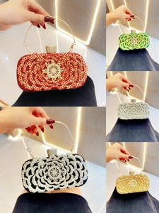 Elegant rhinestone evening clutch bag with hollow flower pattern and metal handle