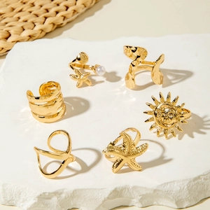 Lot de 6 bagues bohèmes dorées avec étoile de mer, coquillage, perles et motif soleil