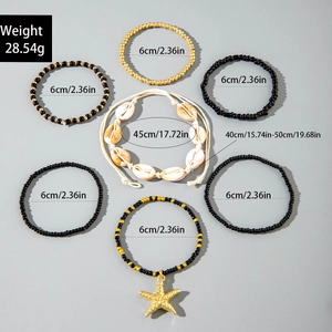 Set of 7 beach bracelets featuring starfishes, shells and beads with dimensions shown