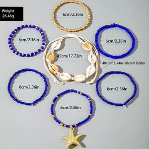 7-piece bohemian beach jewelry set with blue beads, starfish pendant, and shell necklace
