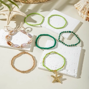 7-piece bohemian starfish beach bracelet set with green resin beads and shells