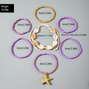 Flat lay of bohemian purple bead bracelets and starfish shell necklace with dimensions