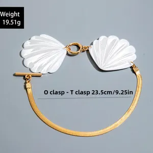 Golden OT clasp necklace with shell pendants, weighing 19.51g and 23.5cm in length