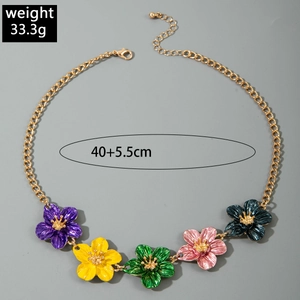 Detail of colorful enamel flower necklace with golden chain showing 40+5.5cm length