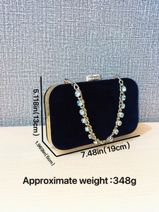 Elegant black velvet clutch with sparkling rhinestones and gold chain strap
