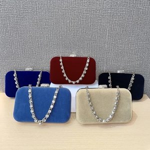 Detailed collection of velvet evening clutch bags in five colors with rhinestone handles