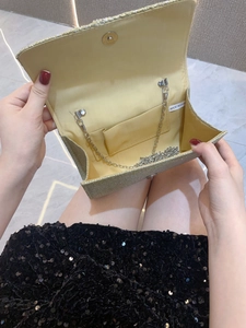 Champagne gold sequin evening clutch bag with metal chain strap and interior pocket