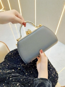 Elegant grey rhinestone evening clutch bag with golden round handle and diamond clasp