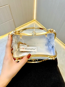 Sparkling silver rhinestone evening clutch bag with gold handle and metal chain strap