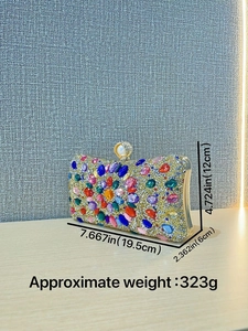 Elegant rhinestone evening clutch with floral crystal patterns and pearl clasp detail