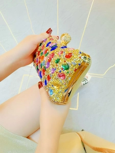 Luxurious heart-shaped evening clutch with multi-colored crystals and gold metal frame