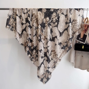 Vintage floral print oversized scarf in black and white hanging with stylish accessories