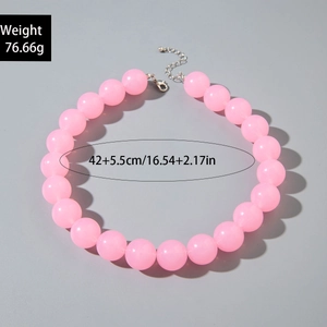 Detail of pink acrylic bead necklace showing 42cm length and silver lobster clasp