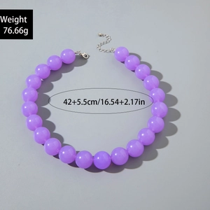 Detail view of purple acrylic bead necklace with length and weight specifications