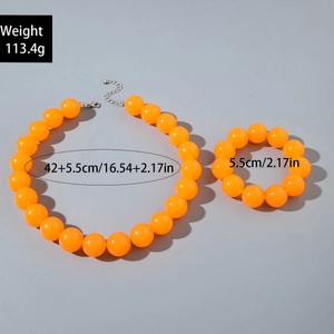 Detail showing orange acrylic bead necklace set with size and weight measurements