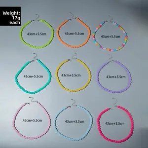 Colorful acrylic bead necklace set in nine vibrant candy colors with adjustable metal chains