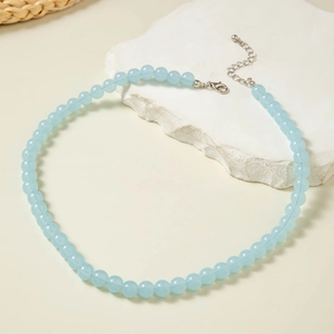 Minimalist light blue beaded necklace with silver lobster clasp and extension chain