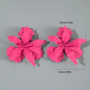 Detail view of large pink metal flower earrings showing 8.2cm size measurements