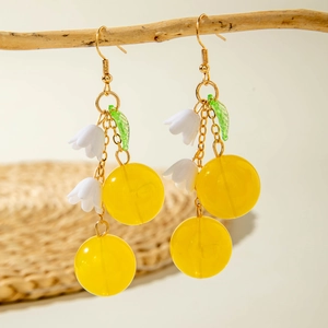 Chic long cherry earrings with white lily of the valley and green leaves in lemon yellow