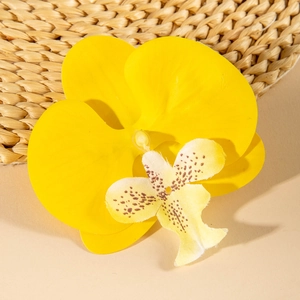 Detailed close-up of a bright yellow orchid flower clip with natural spot textures