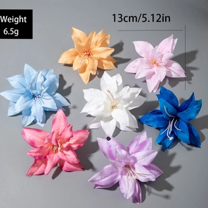 Detail of 13cm lily flower hair clips showing multi-color fabric petals and size measurements