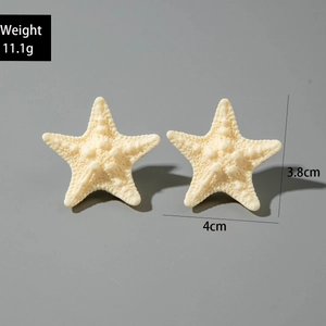 Close-up of starfish earrings with detailed texture and size dimensions 4cm by 3.8cm