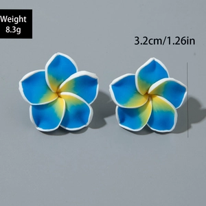 Detail view of colorful plumeria flower earrings showing 8.3g weight and 3.2cm size