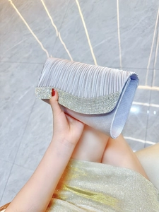 Elegant lilac pleated evening clutch bag with sparkling rhinestone trim and metal chain strap