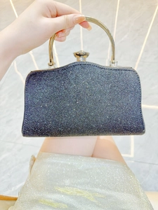 Elegant black sequin evening clutch bag with gold metal handle and crystal clasp