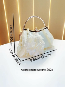 Elegant cream satin evening bag with large floral design and gold ring handle