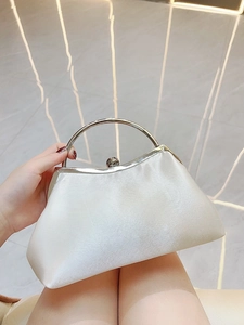 Elegant white satin evening bag with silver metal ring handle and retro kiss lock closure