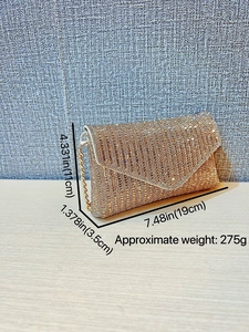 Pochette de soirée dorée avec strass, bandoulière chaîne et dimensions 19x11x3,5 cm