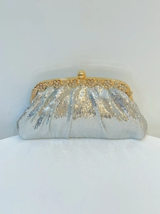 Detailed silver sequin clutch bag with golden floral rhinestone trim and ball clasp closure
