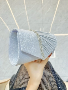 Elegant pleated silver-blue evening clutch with sparkling rhinestone band for banquets