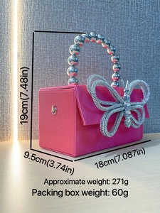 Pink silk satin box evening bag with large rhinestone bow and silver beaded handle
