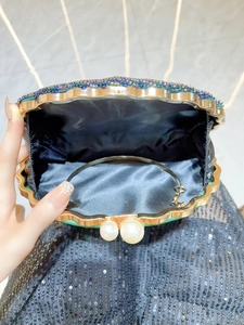 Vintage shell-shaped evening bag with colorful bead embroidery and pearl clasp closure