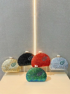 Vintage beaded evening clutch bags with peacock pattern and pearl clasp closure