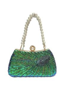 Detailed view of peacock green sequin evening bag with elegant pearl handle and clasp