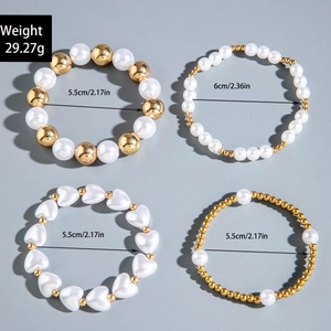 Detail view of 4-piece pearl bracelet set showing sizes and bead arrangement