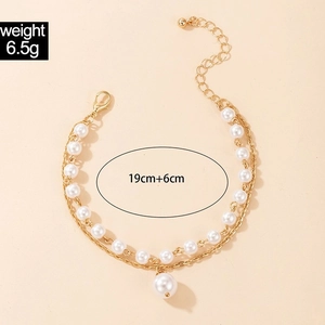 Detail view of double-layer pearl bracelet with dimensions 19cm+6cm and weight 6.5g