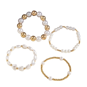 Four-piece gold beaded bracelet set with white pearls and heart charms for women