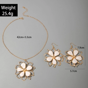 Detail of cream enamel flower jewelry set with dimensions and weight 25.4g