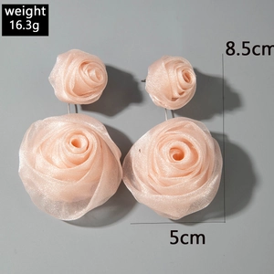 Detailed view of large pink fabric rose earrings with dimension and weight markers