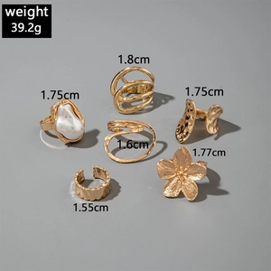 Flat lay of 6-piece gold alloy ring set showing detailed weight and size measurements