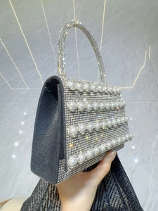 Luxury silver rhinestone evening clutch bag with pearl accents for party and banquet