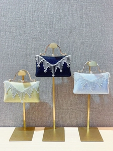 Elegant rhinestone tassel evening clutch bags in navy, yellow, and light blue set