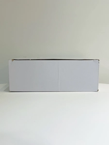 Neutral white corrugated cardboard packaging box for luxury evening clutch bag protection
