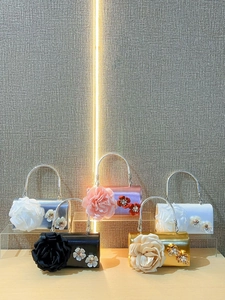 Mini satin floral evening bags with rose petals and pearl accents in multiple colors