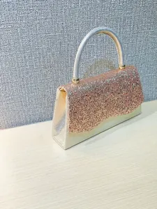 Elegant evening bag with glitter sequins and top handle for weddings and gala events